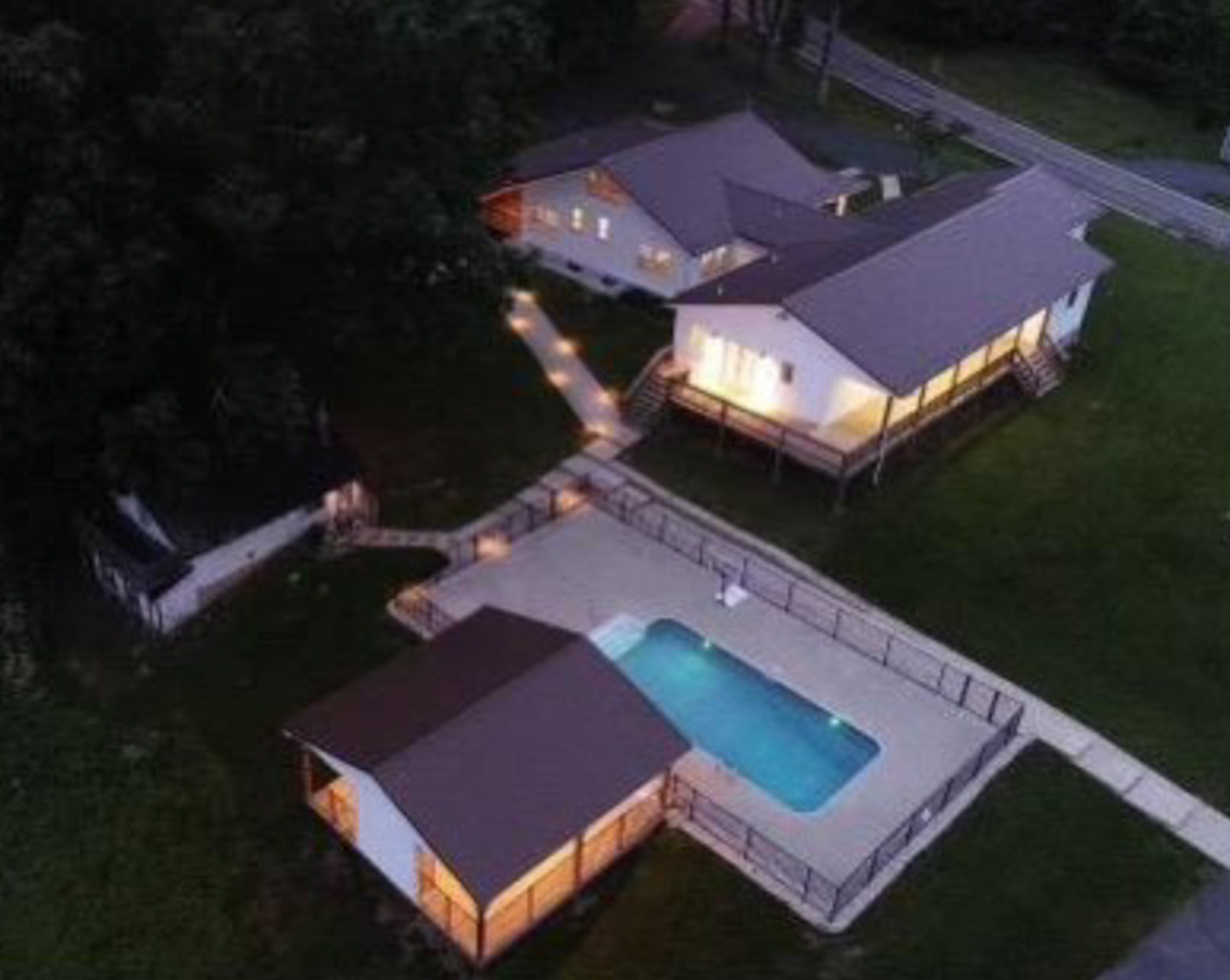 Aerial view of the pool, pavilion, and accessible outdoor recreation spaces at Jake and Angie Beamer’s provider group home in Hillsville, Virginia.